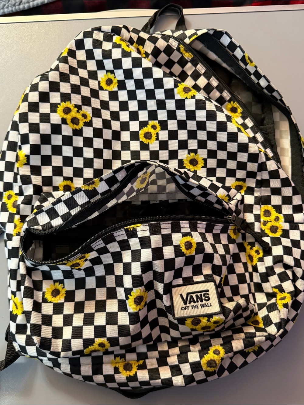Vans Black & White Checkerboard Backpack with Yellow Sunflowers